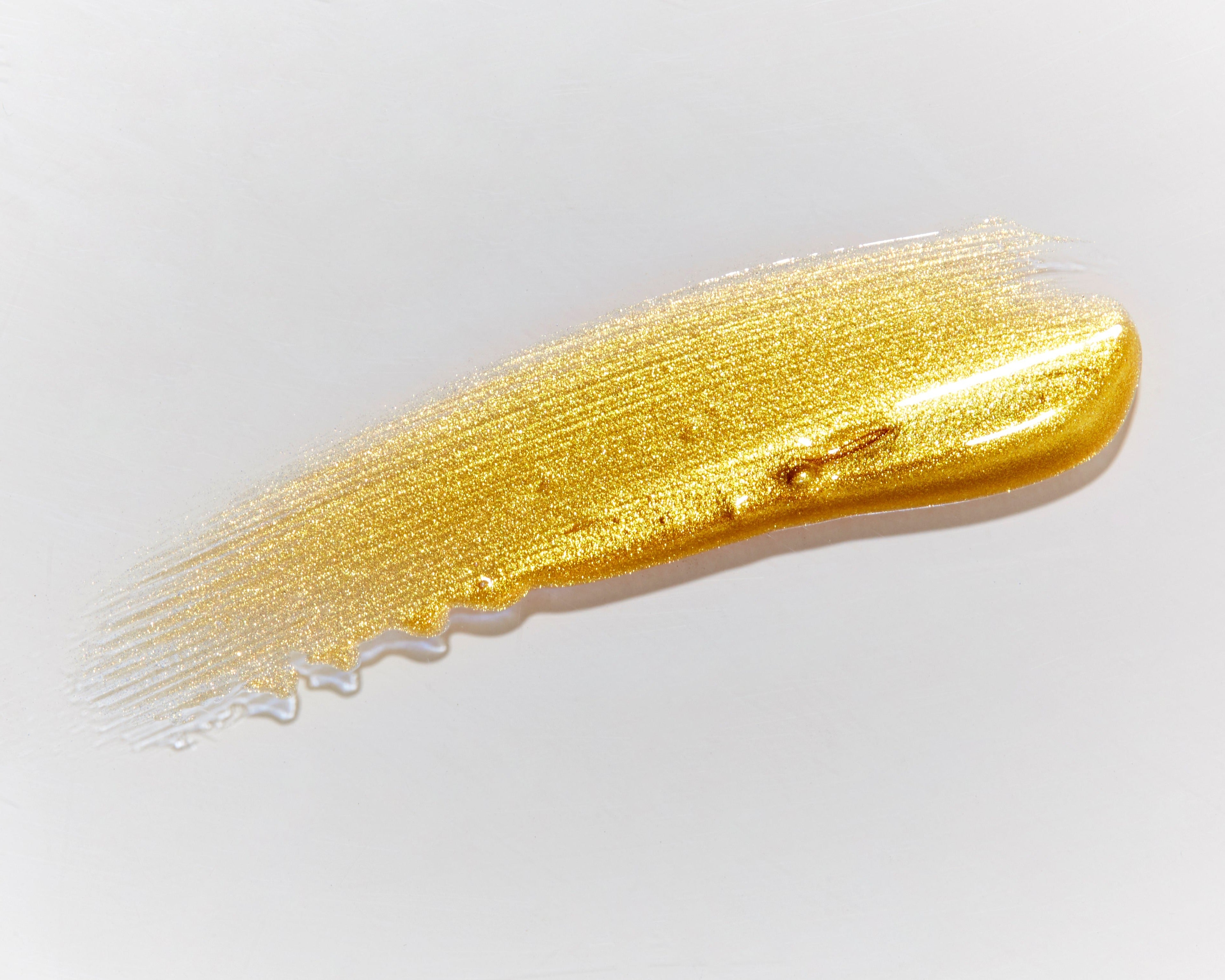 Swatch image of Mo-Beauty Shop's Gimme Mo-Glow All-Over Highlighter in the Gold shade.