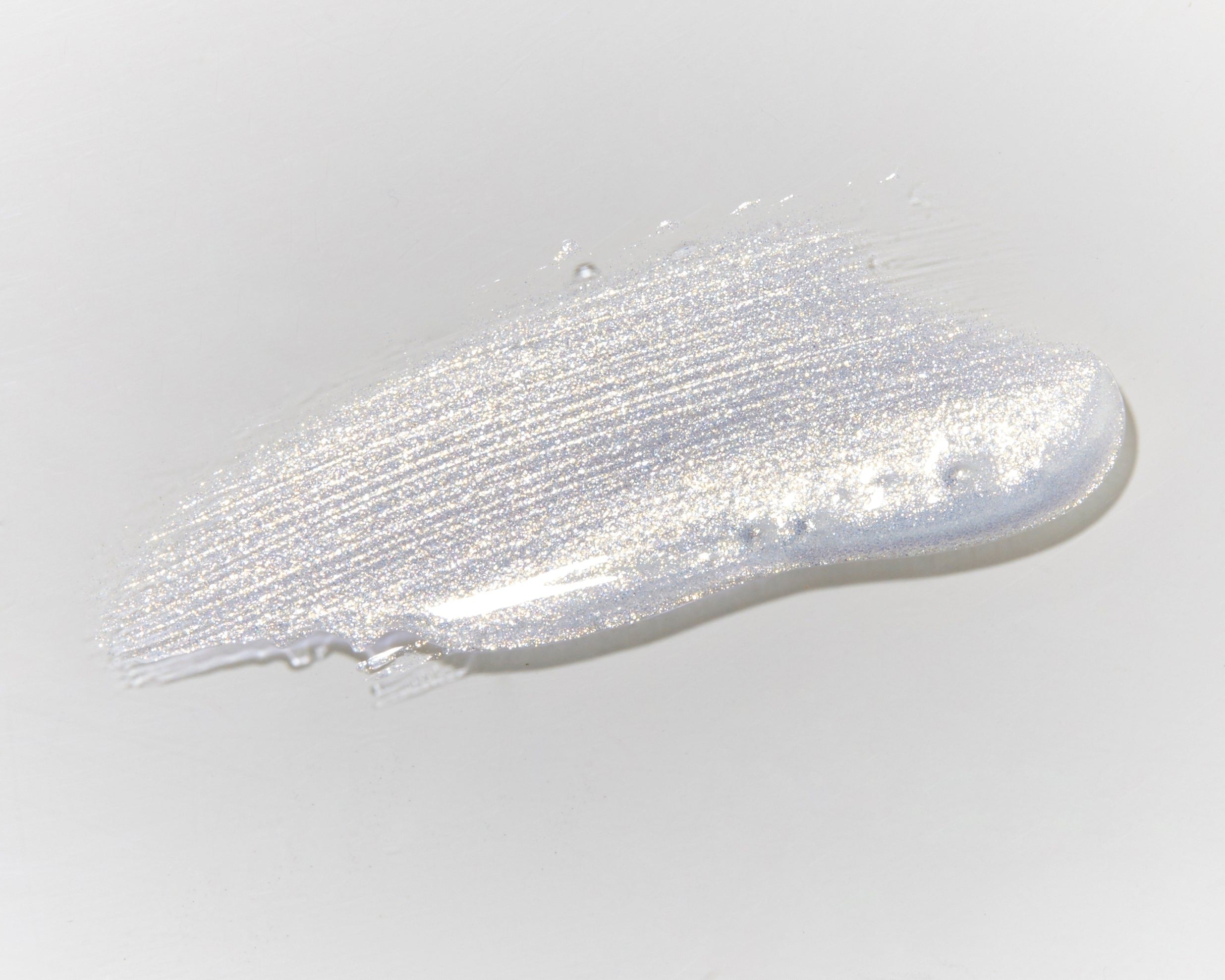 Swatch image of Mo-Beauty Shop's Gimme Mo-Glow All-Over Highlighter in the Silver shade.