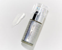 Product with swatch image of Mo-Beauty Shop's Gimme Mo-Glow All-Over Highlighter in the Silver shade.