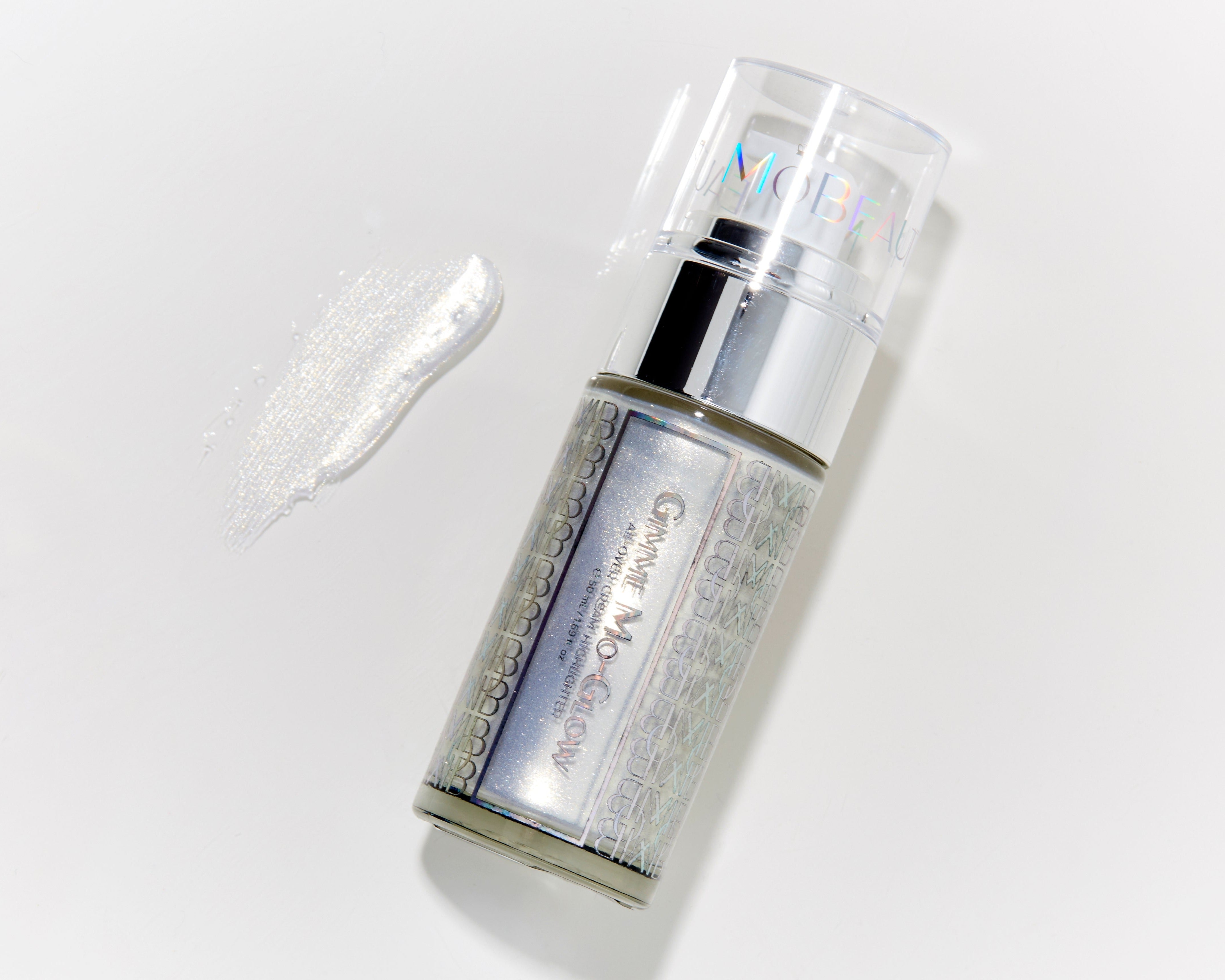 Product with swatch image of Mo-Beauty Shop's Gimme Mo-Glow All-Over Highlighter in the Silver shade.