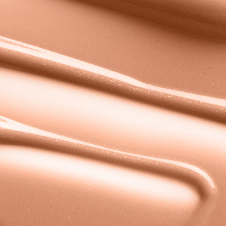 Close-up swatch image of Mo-Beauty Shop's Mo-Shine Lip Gloss in the shade Patricia's Sister, a soft nude-pink shade.