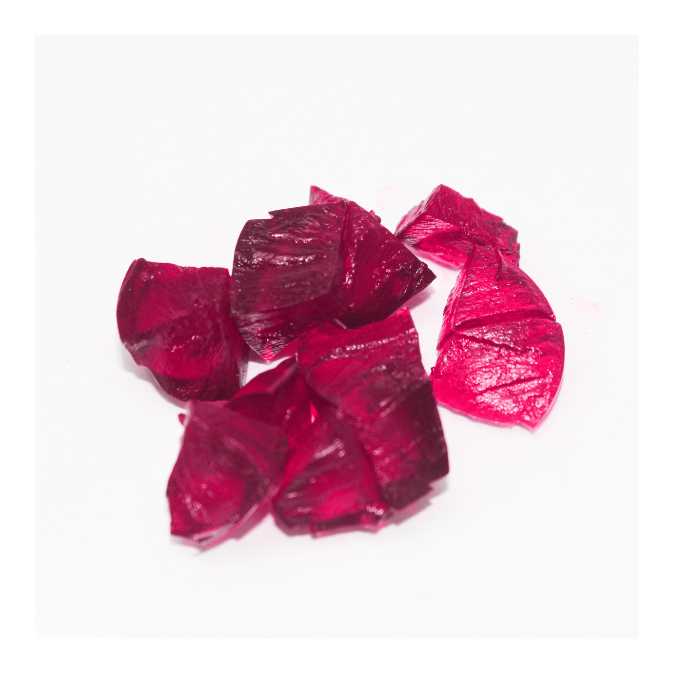 Texture image of Mo-Beauty Shop's Mo-Jelly Blush + Lip Tint in the shade Passion Pop, a buildable pink color. 