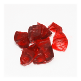 Texture image of Mo-Beauty Shop's Mo-Jelly Blush + Lip Tint in the shade Chili Crisp, a buildable red color. 